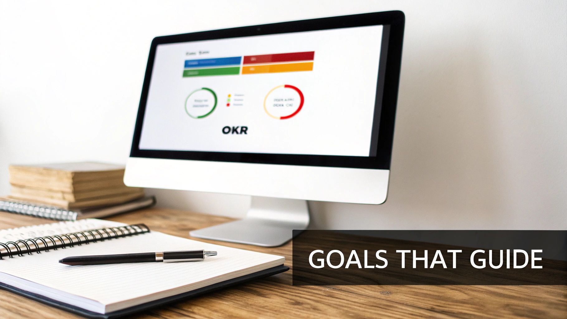 Team members discussing goals around a whiteboard.