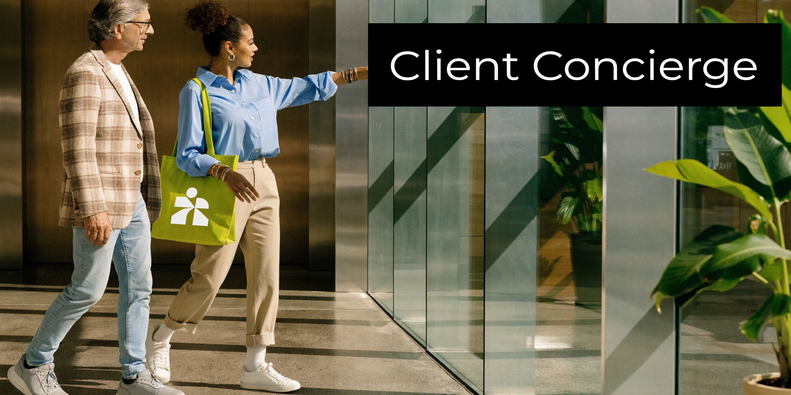 A professional inbound sales representative pointing toward a windowed office while walking with a client.