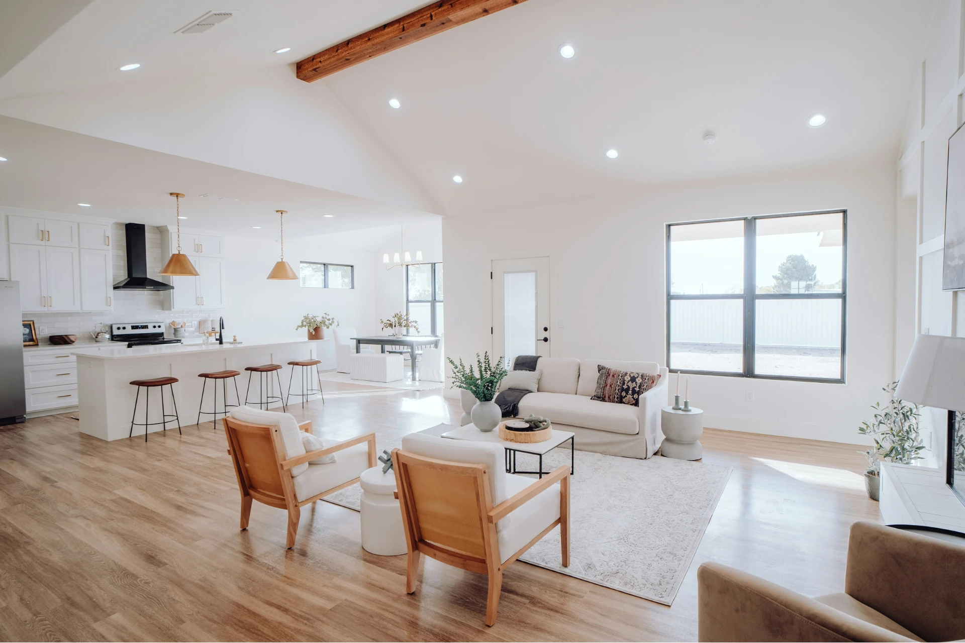 a bright, modern kitchen and living room