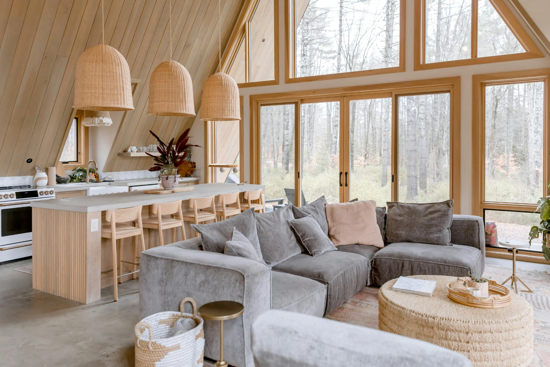 A modern cabin interior with triangular custom windows