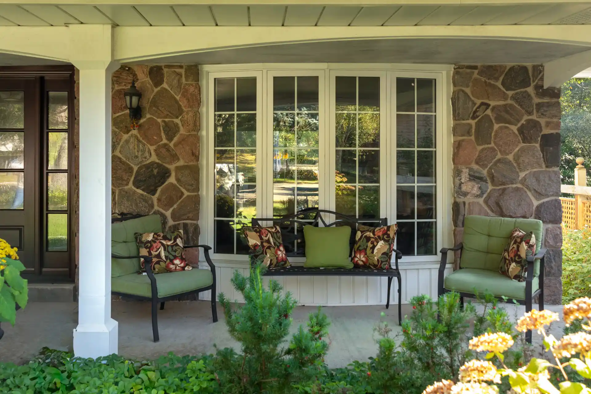 Four Clera casement windows with mullions decorate a home’s exterior