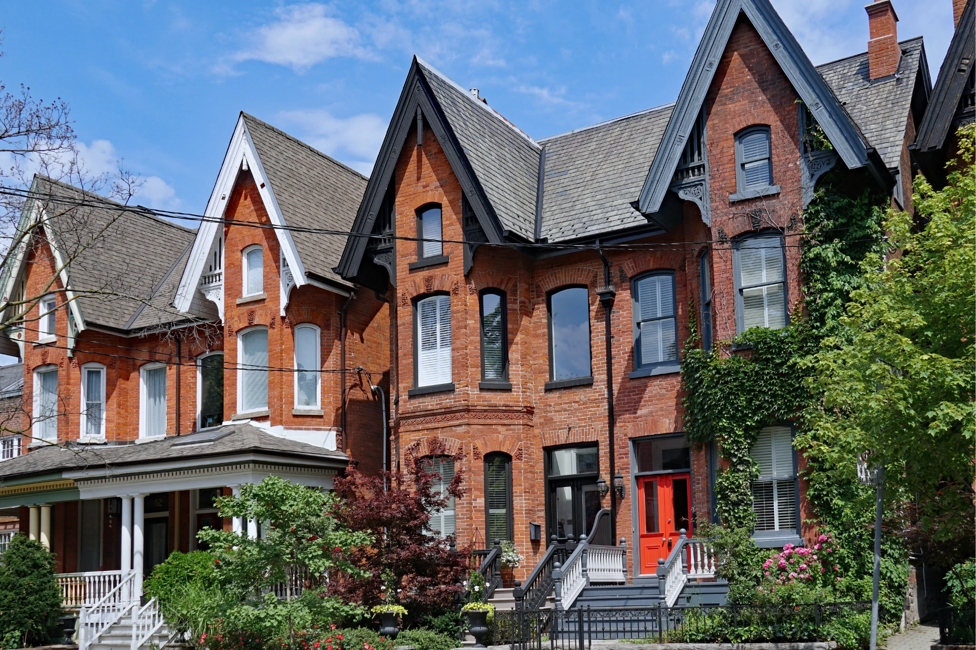Row of old Victorian semi-detached houses with gables