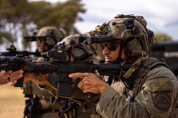 3 swat holding gun 