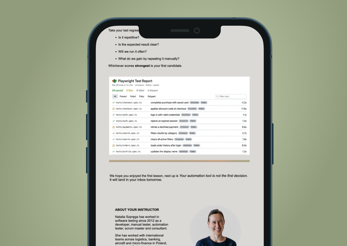 A phone displaying the email course on a green background