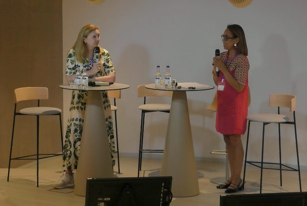 Karine Aureli contributing to the panel