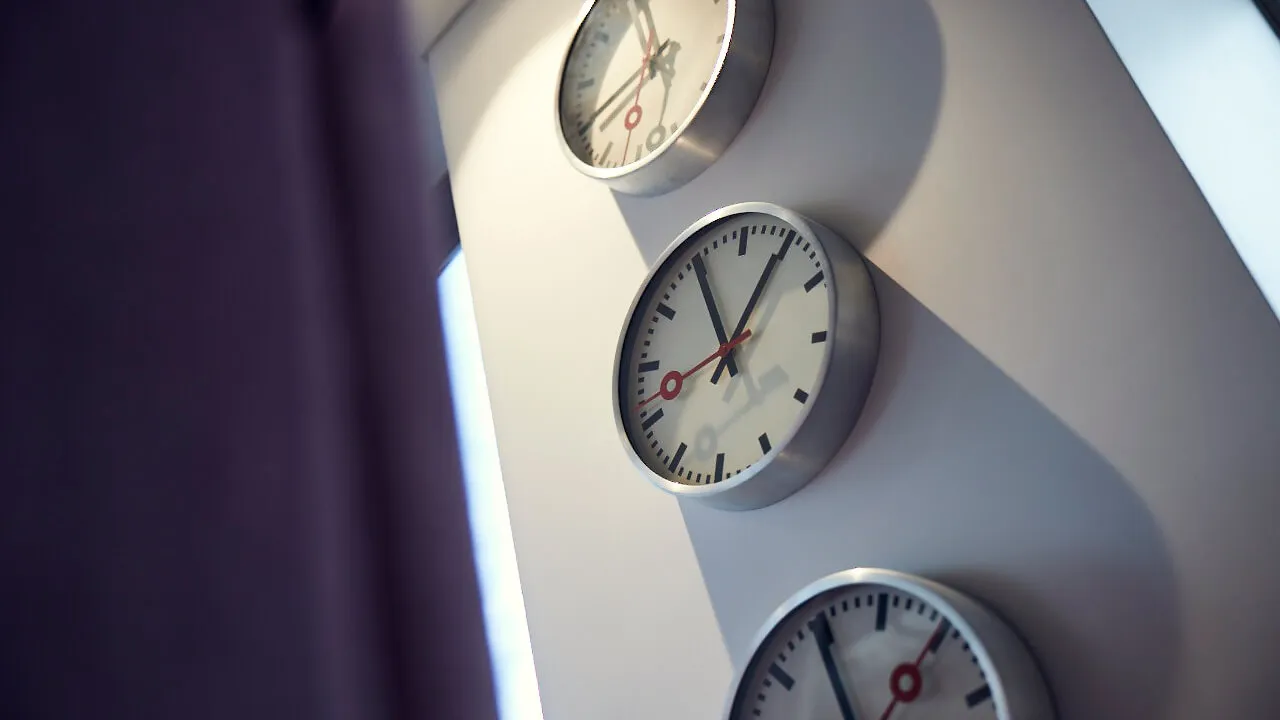 Three clocks on a wall