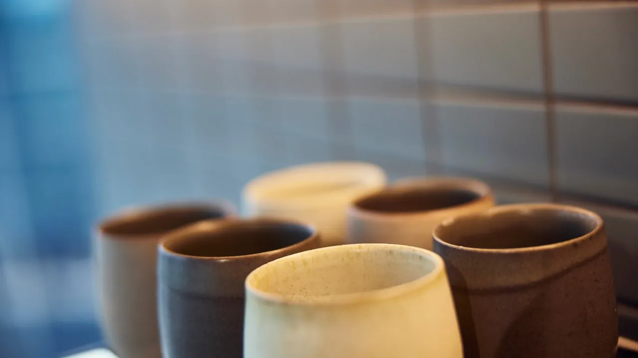 Six clay mugs