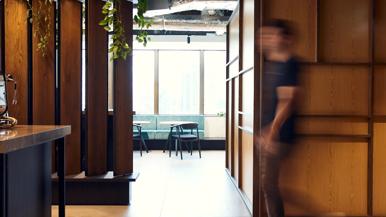 HGM employee walking through the office