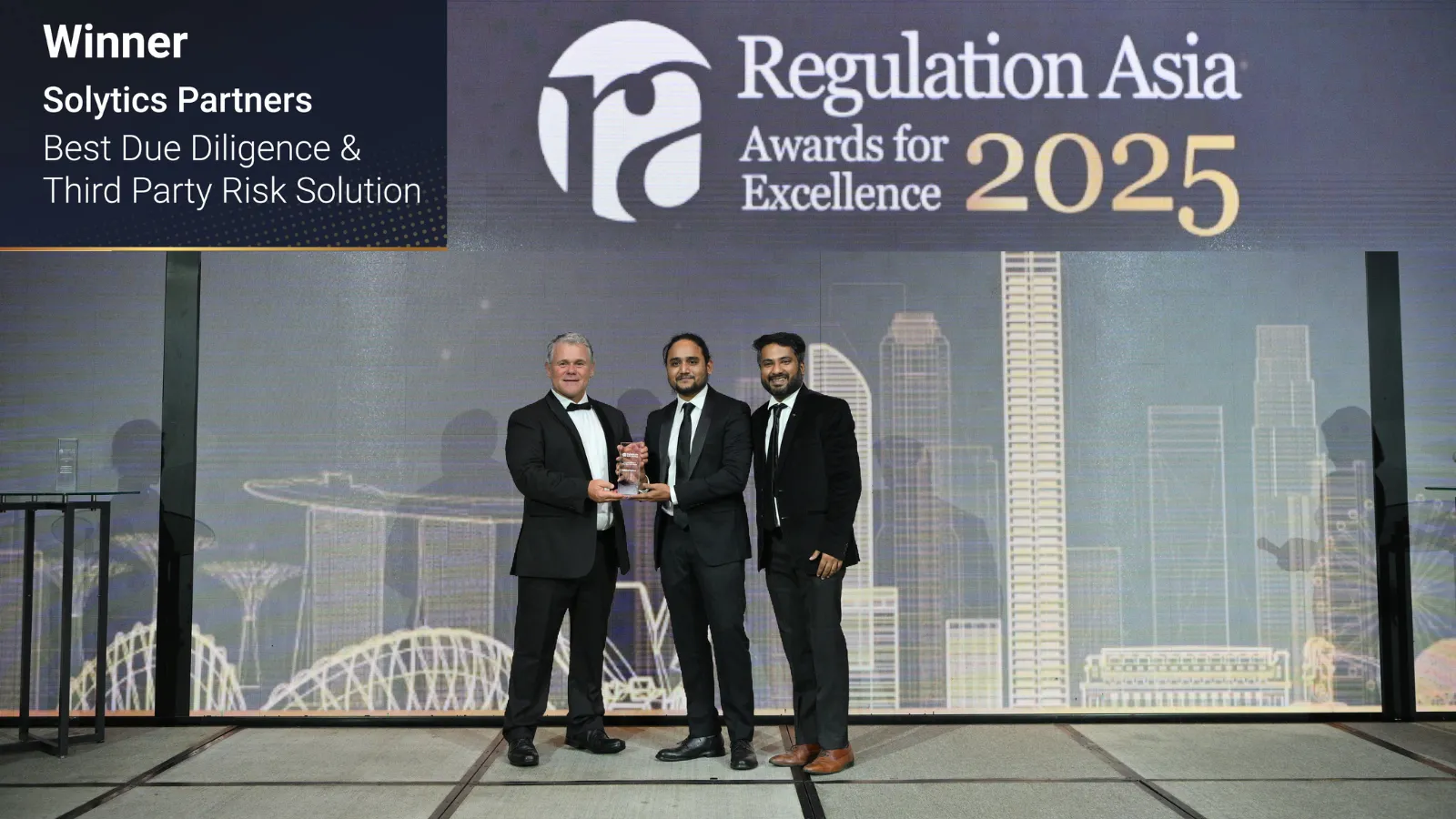 Award ceremony photo showing Solytics Partners team receiving the Best Due Diligence and Third-Party Risk Solution recognition at Regulation Asia Awards 2025.