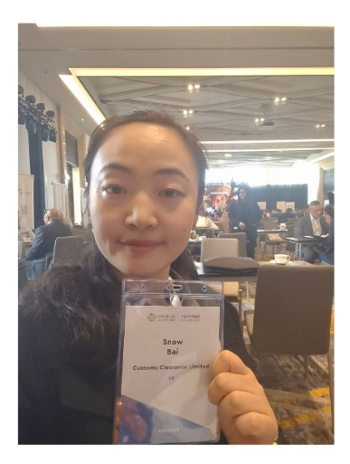 A person holding a badge