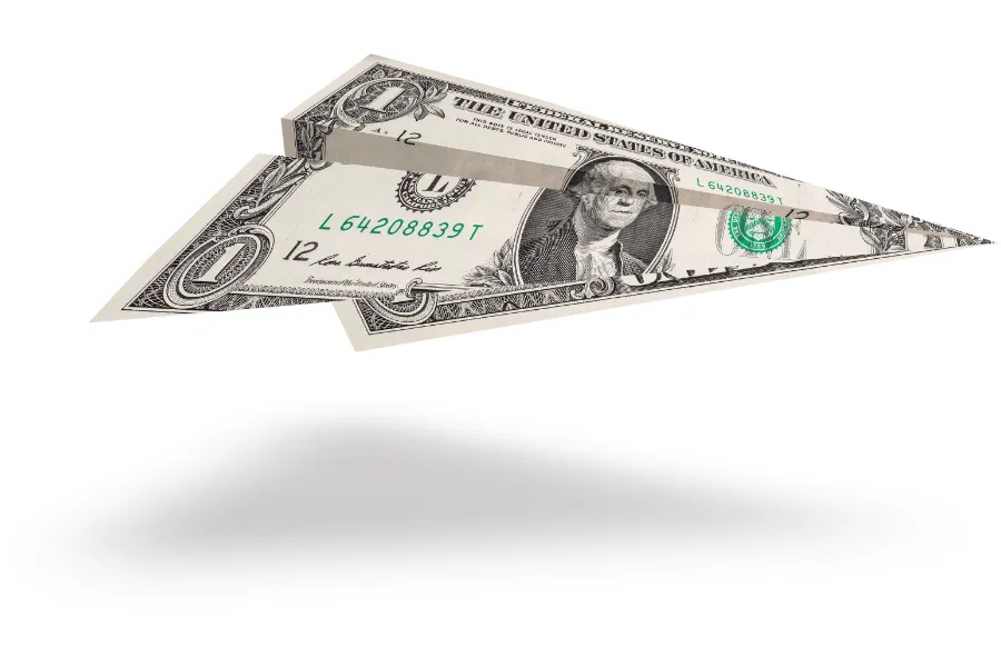 paper airplane made of dollar bill