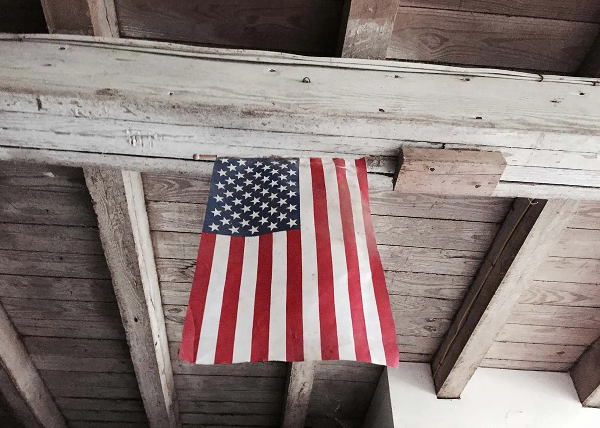 american flag hanging from ceiling