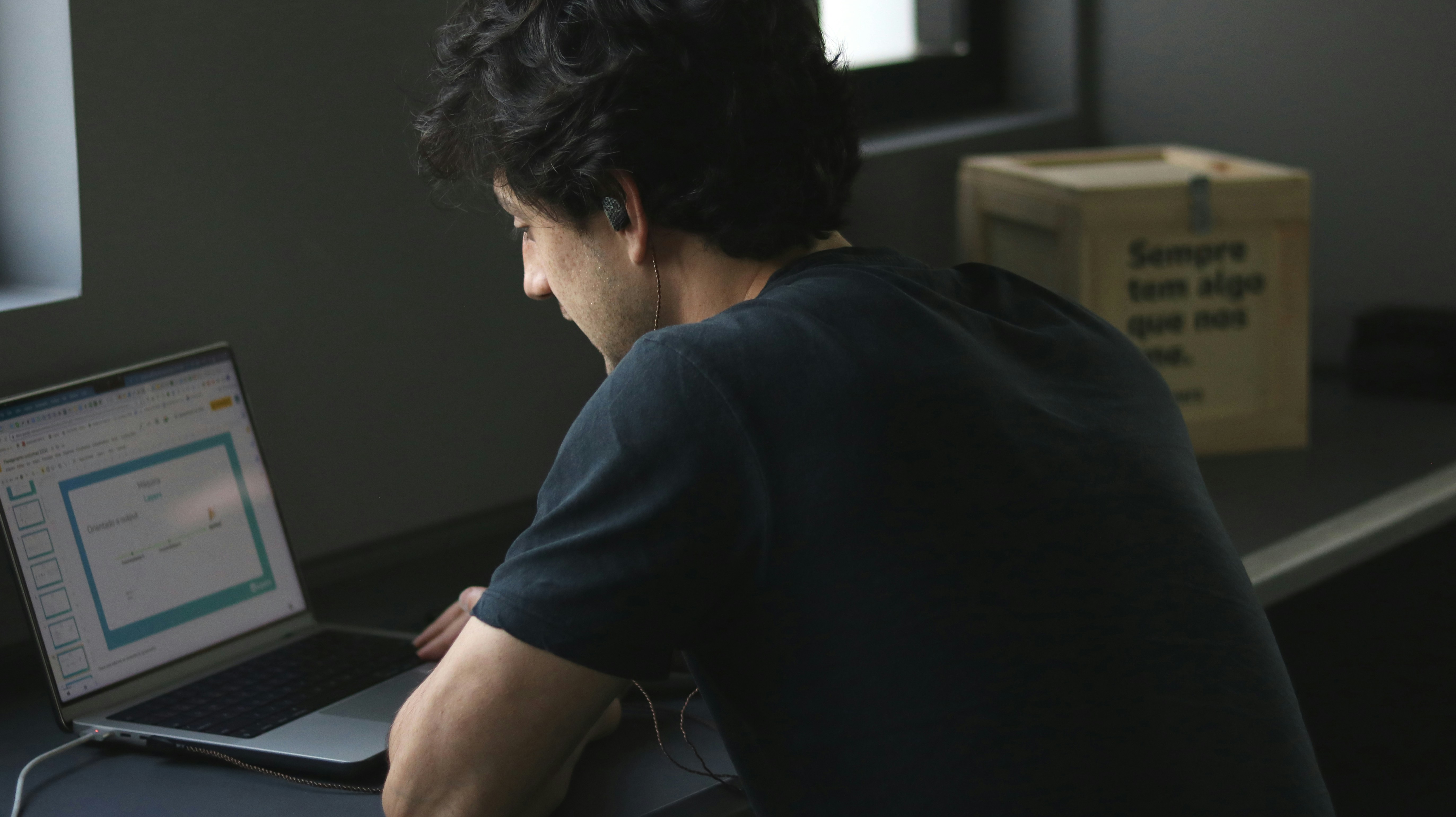 Focused entrepreneur analyzing a pitch deck in Moncton workspace