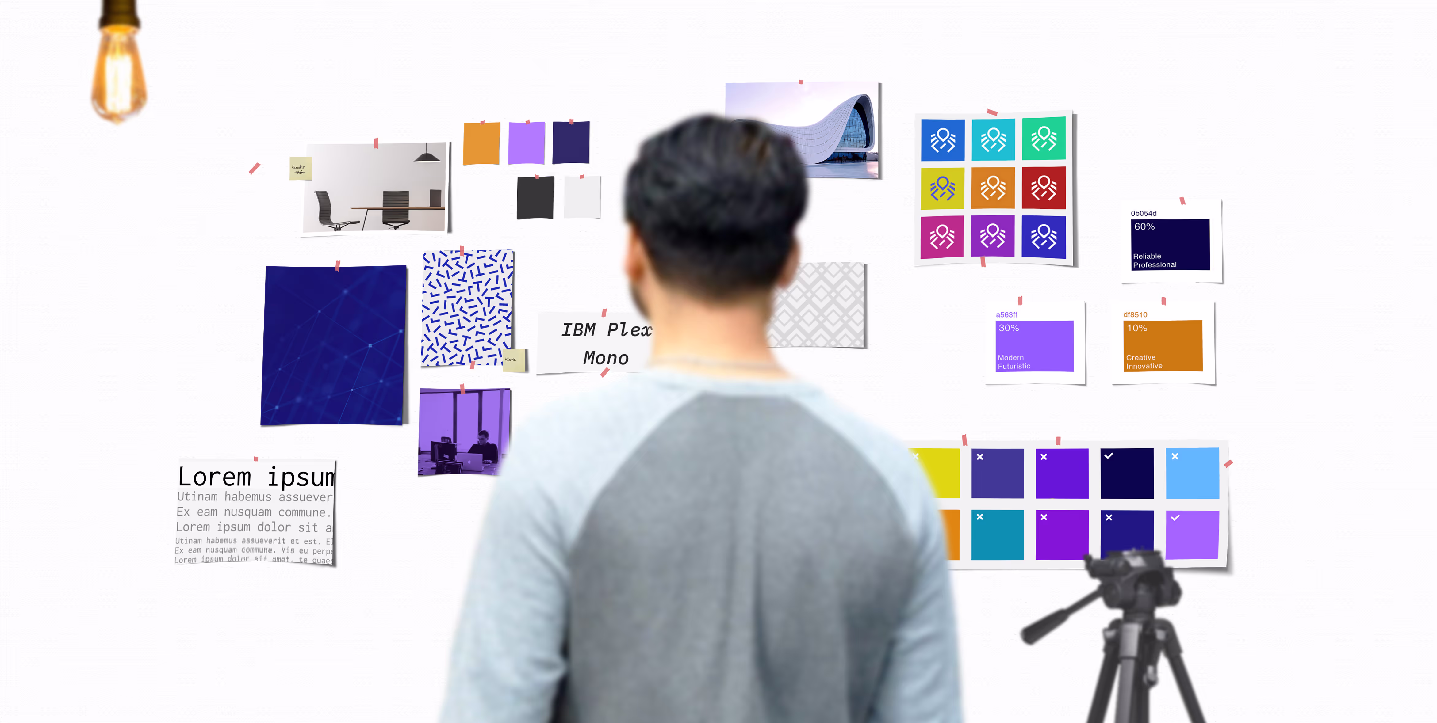 Creative strategy meeting in a Saint John, NB office with a mood-board wall featuring a collage of colors, typography samples, and design inspiration.