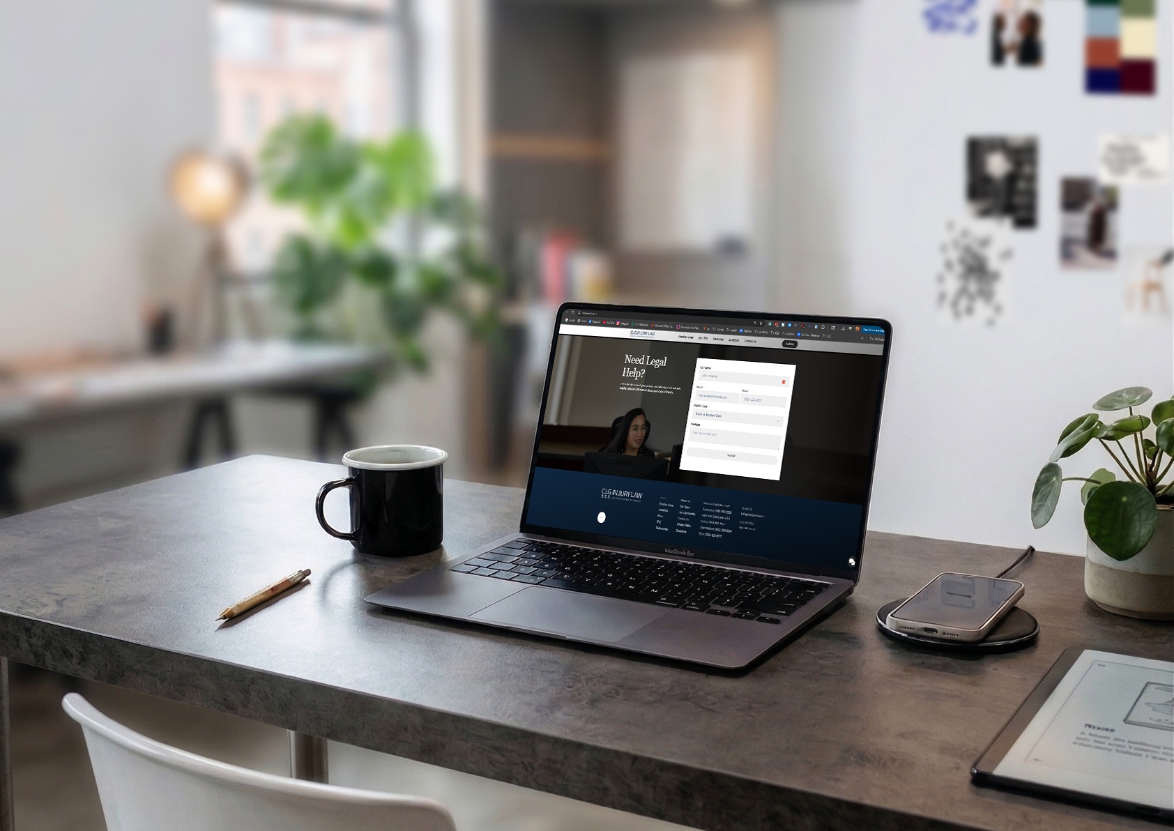 Laptop and smartphone side by side showing a fast, mobile-optimized law firm website with a tappable phone number and simple contact form.
