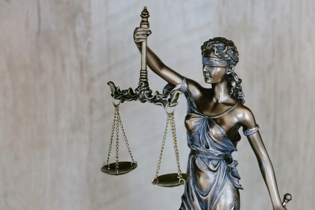 Statue of Lady Justice symbolizing Halifax law firms transitioning from traditional receptionists to AI call agents