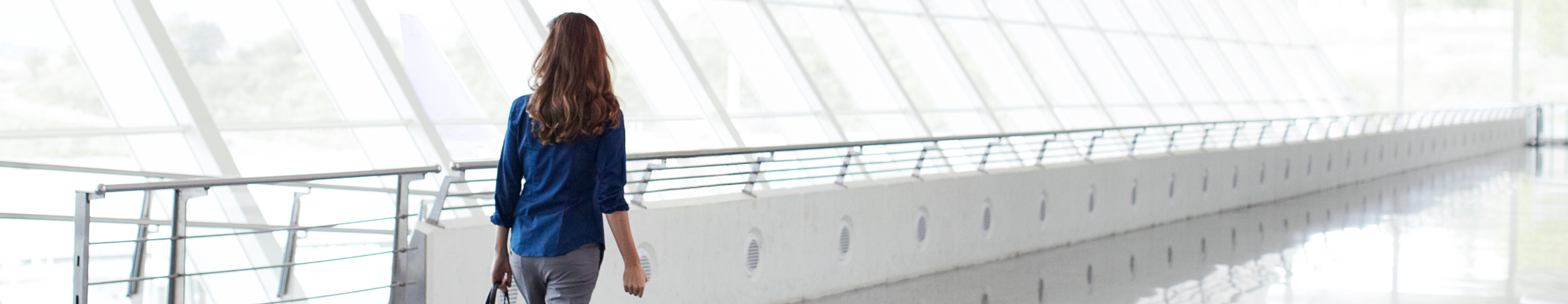 Woman walking through the airport