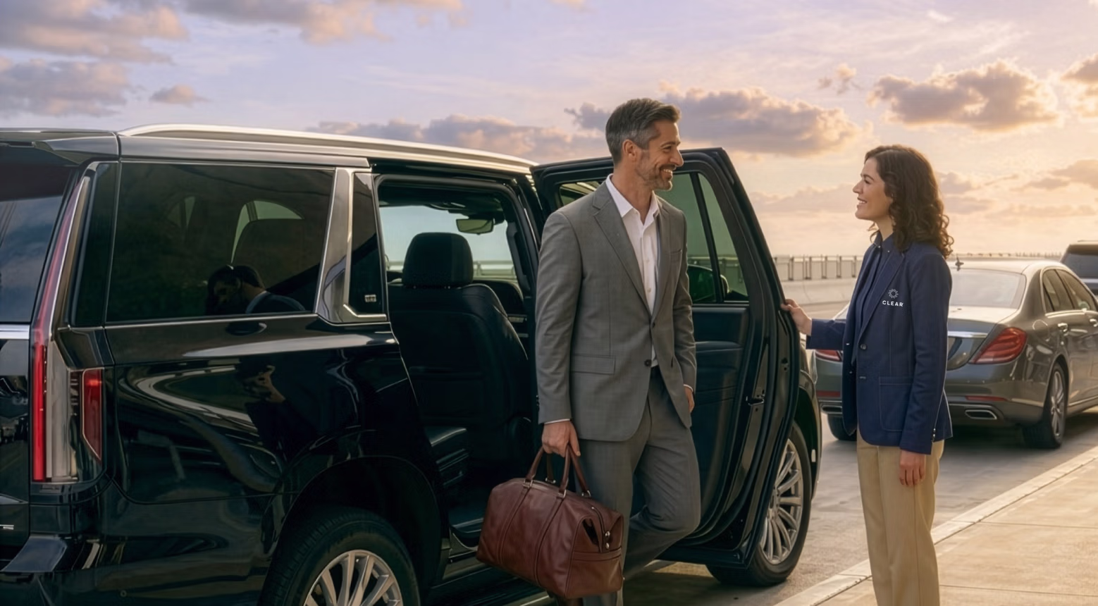 CLEAR Concierge helping with bags