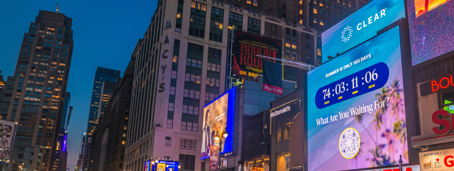 CLEAR's summer countdown clock as a large digital billboard in Times Square