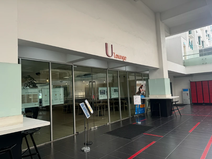 Before refurbishment at the U Lounge signage