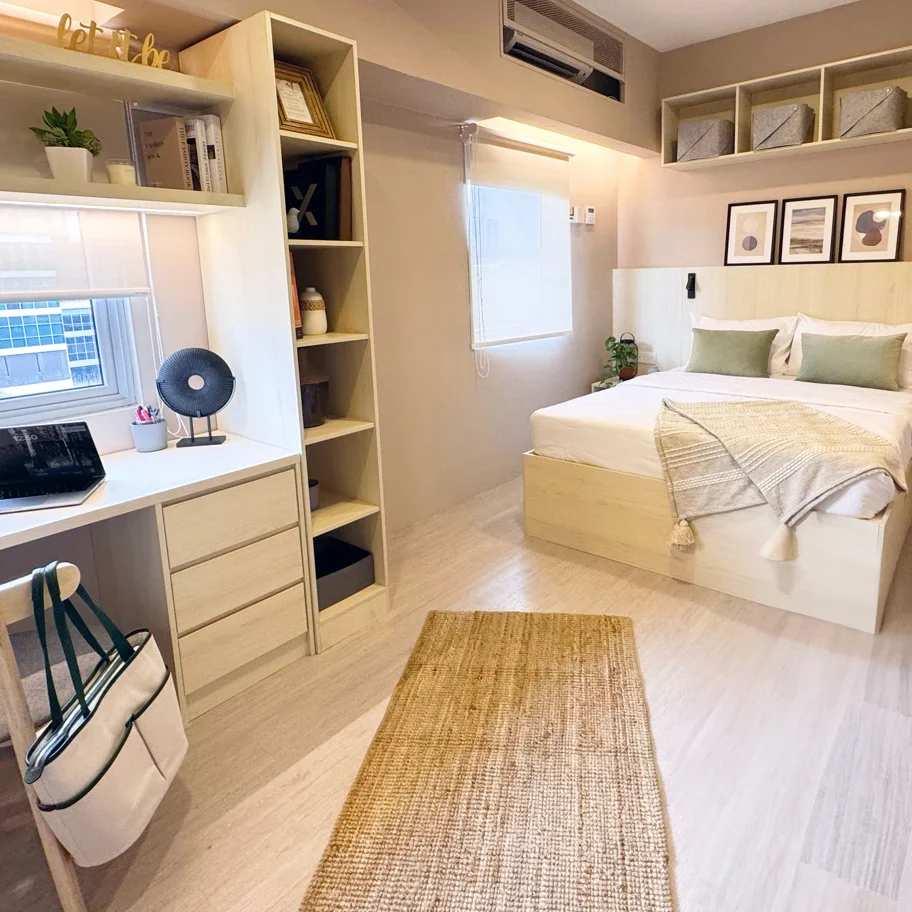Refurbished student room at Taylor’s Residence with a study desk, built-in shelving and a double bed