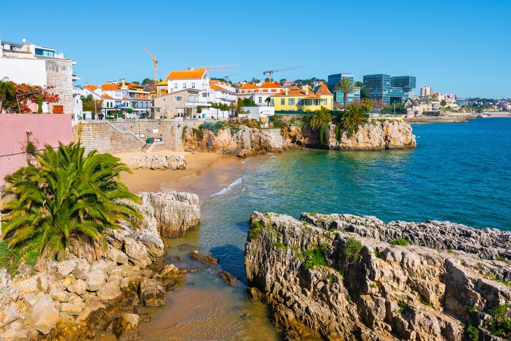 A beach in Cascais, showing the town and the ocean