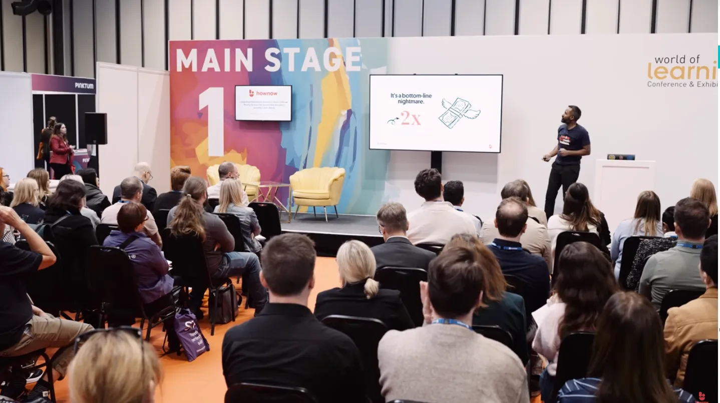 Nelson Sivalingam, CEO of HowNow, speaking at a learning and development event