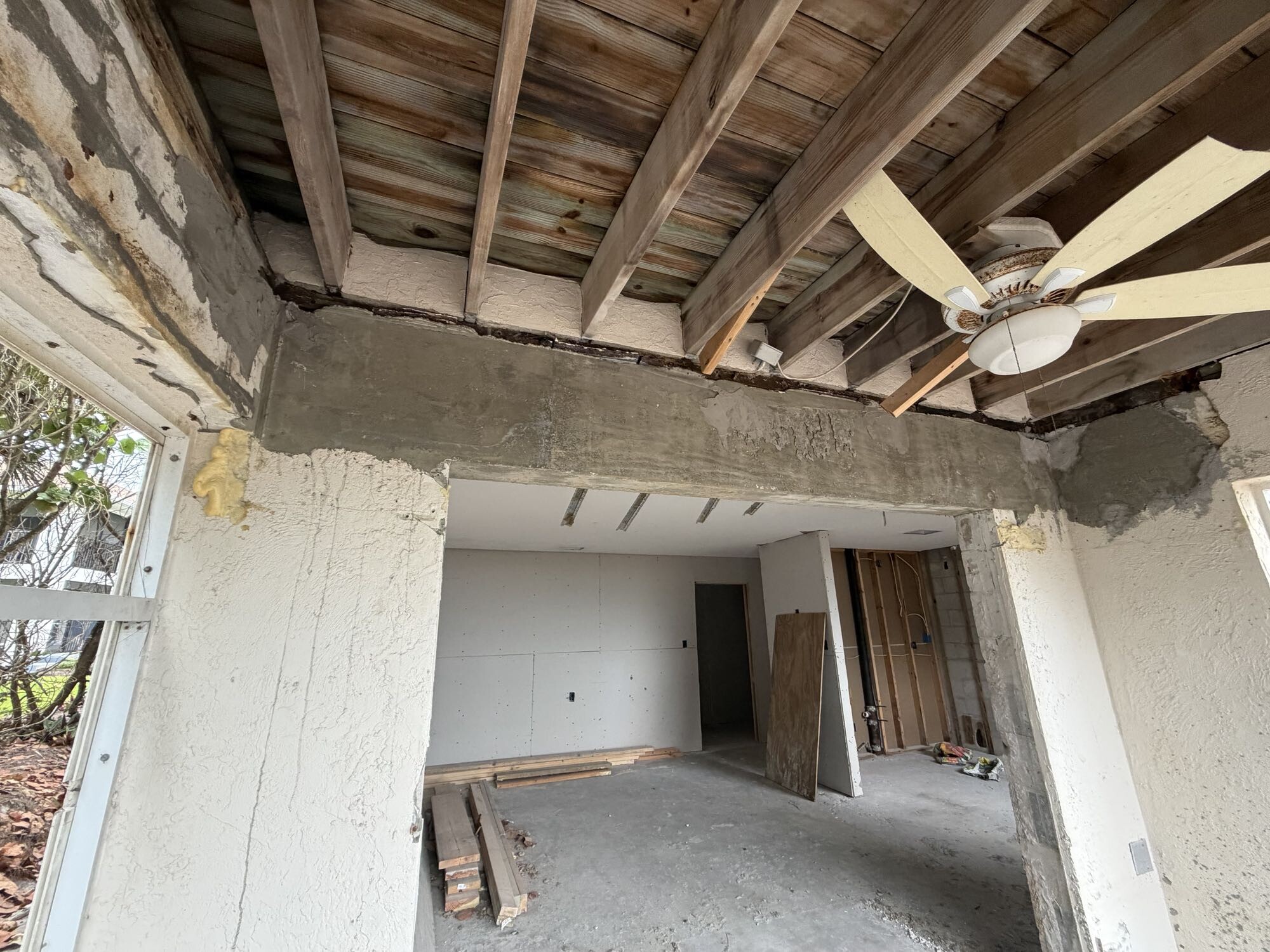 Hurricane damage pile of sand in unit foyer