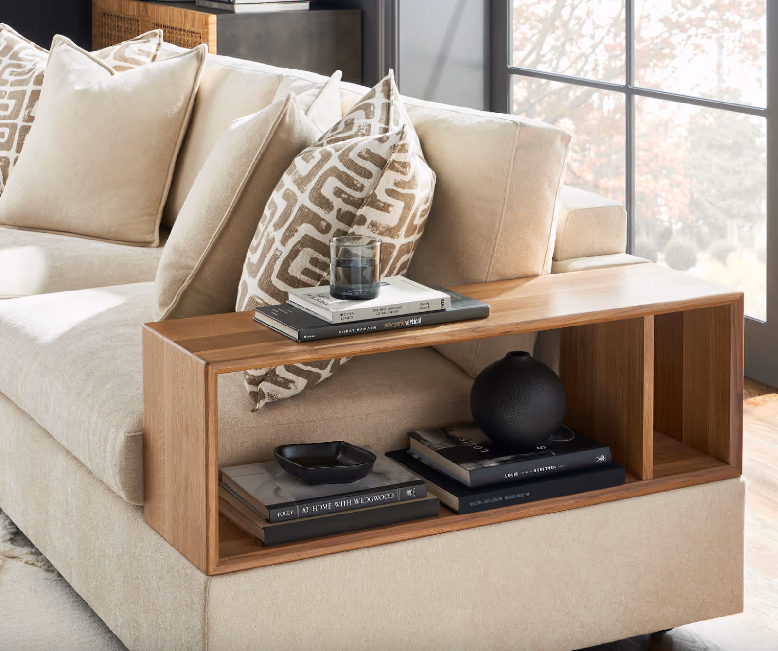 Side table incorporated into sofa