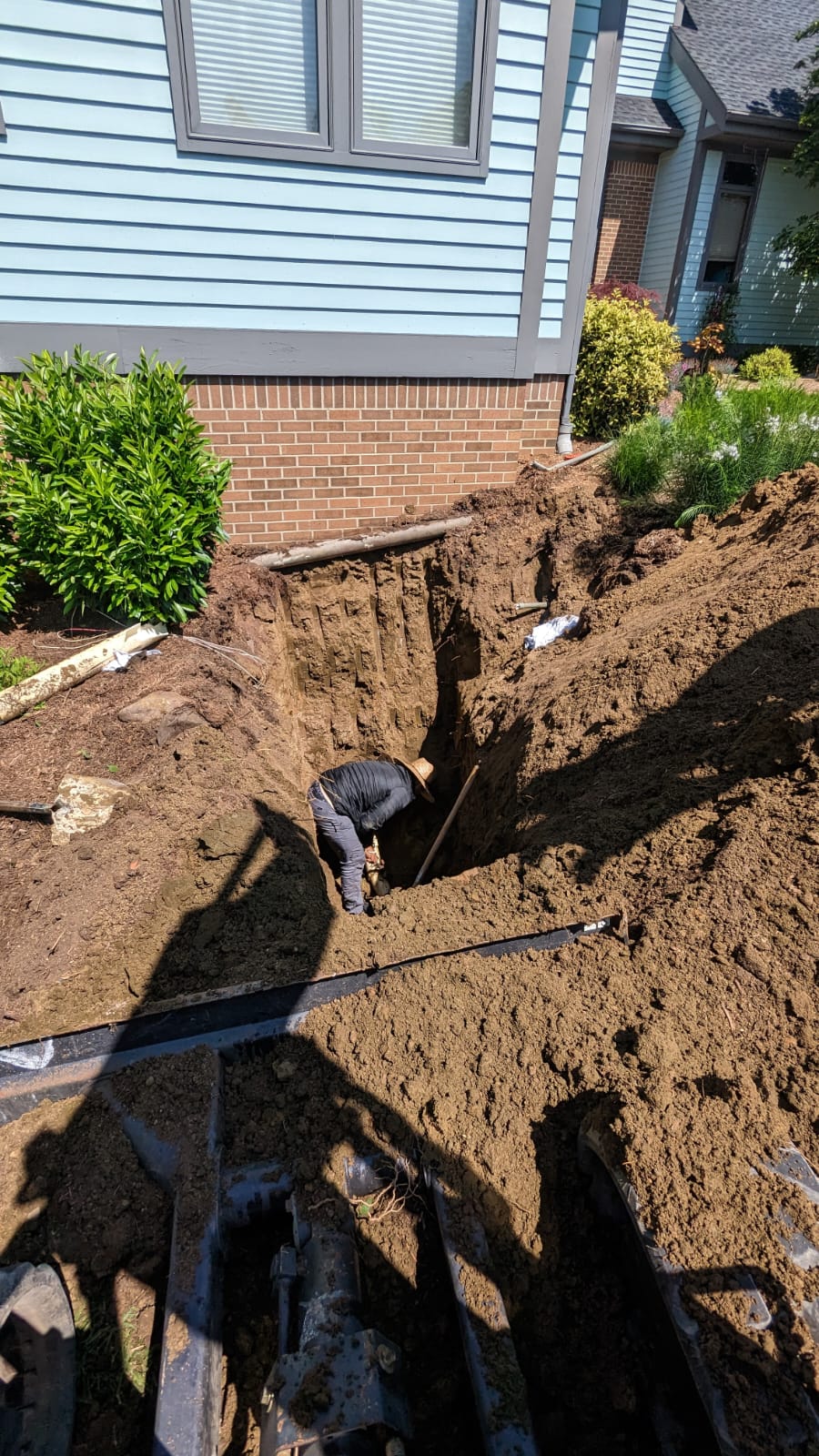 Underground excavation and repair work by Castro Home Services.