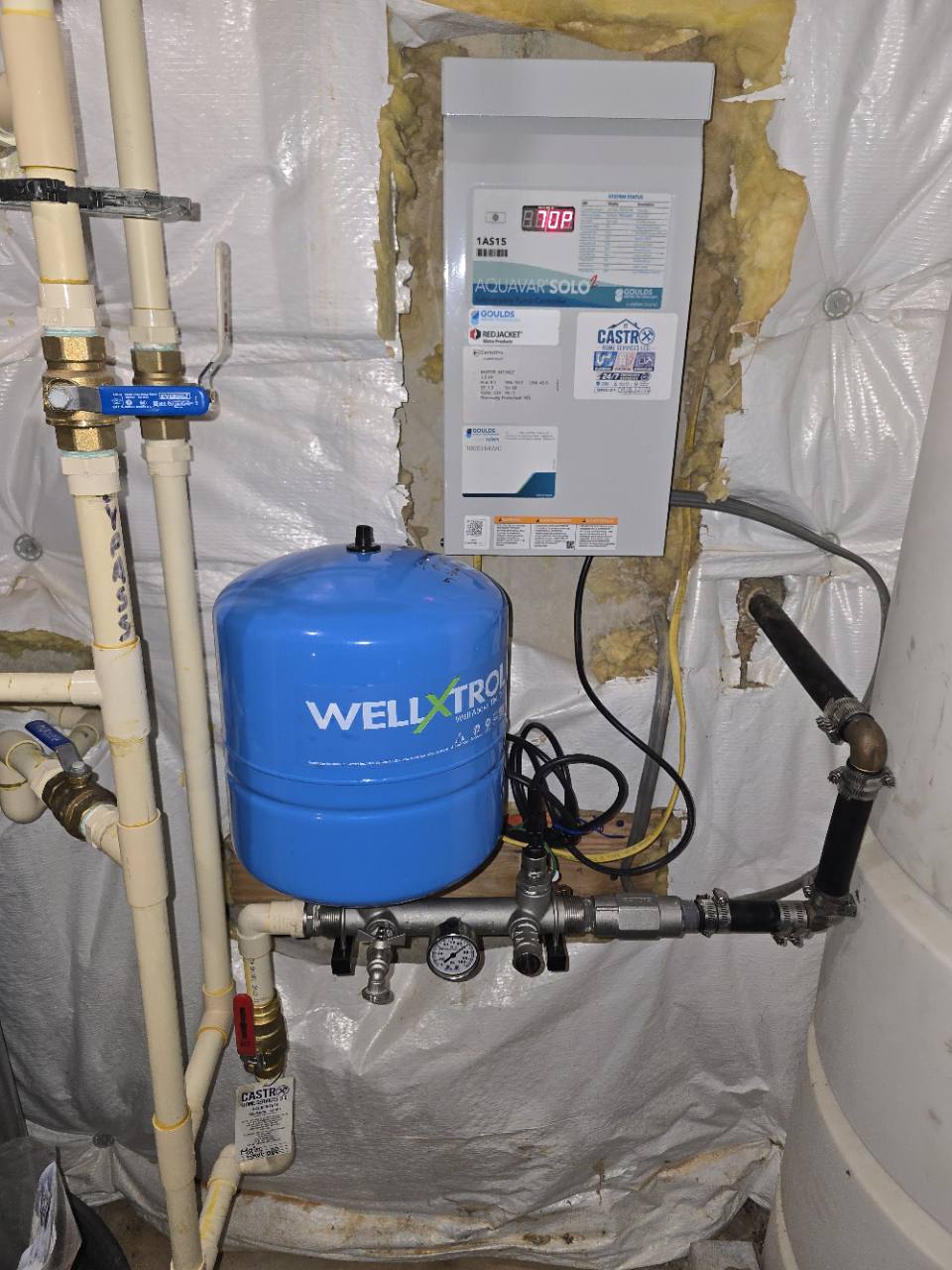 Well pressure tank and Aquavar pump controller installed by Castro Home Services.