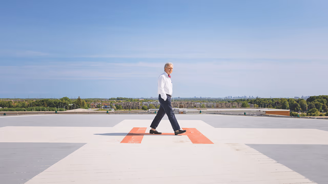 Two people holding stuffed bear