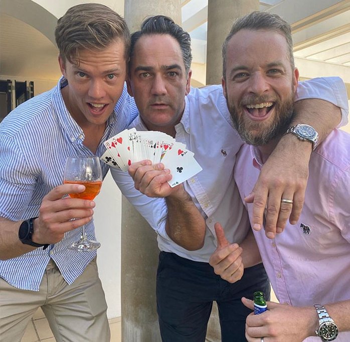 Magic Mike with Hamish and Wippa fanning a deck of cards
