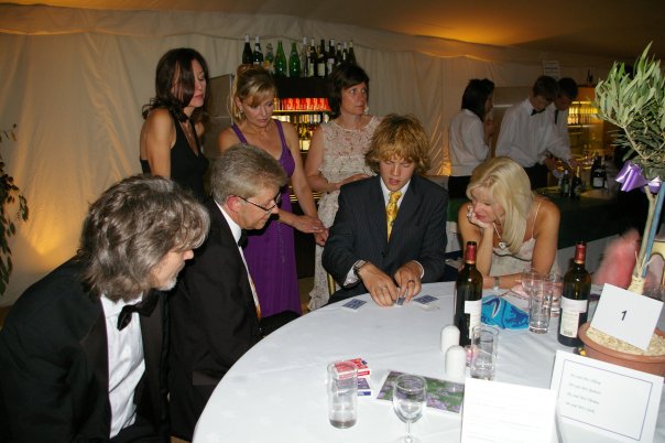 A young Magic Mike performing to guests at a party