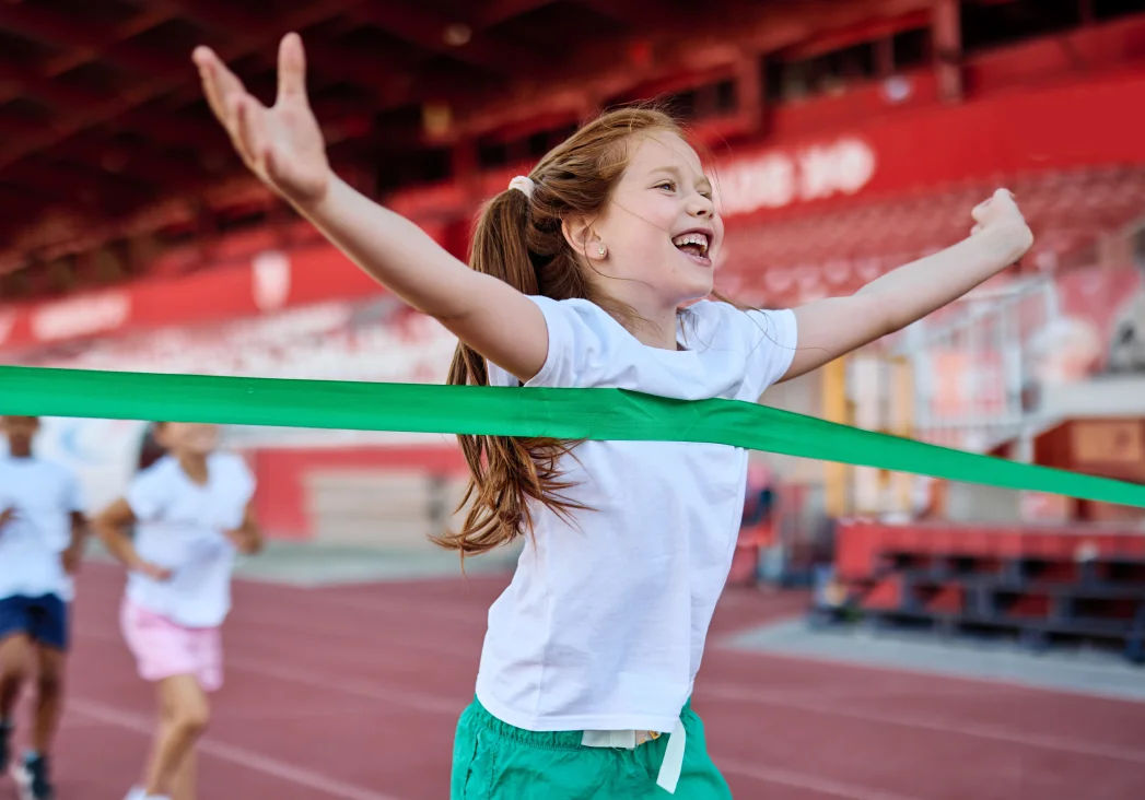 Kid running during a fundraiser fun run.
