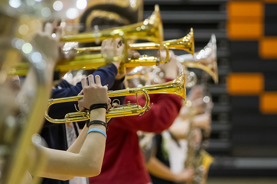 Students playing instruments paid for by performing arts fundraising.