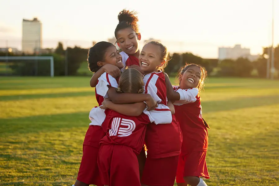 Youth sports fundraising makes celebratory moments like this girls soccer team is having, possible.