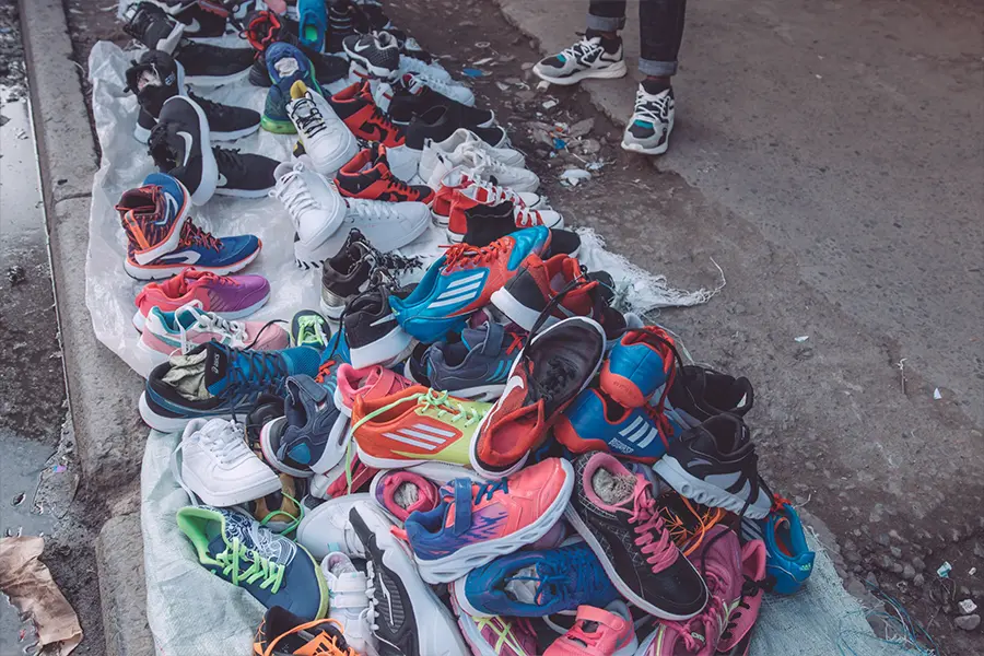Shoes being prepped for a shoe drive.