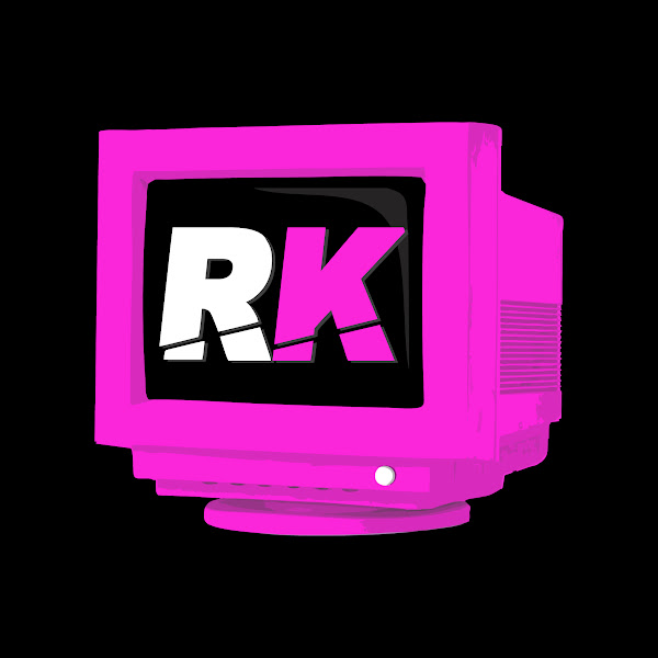 Bright pink retro computer monitor displaying stylized white and pink letters 'RK' on a black screen.