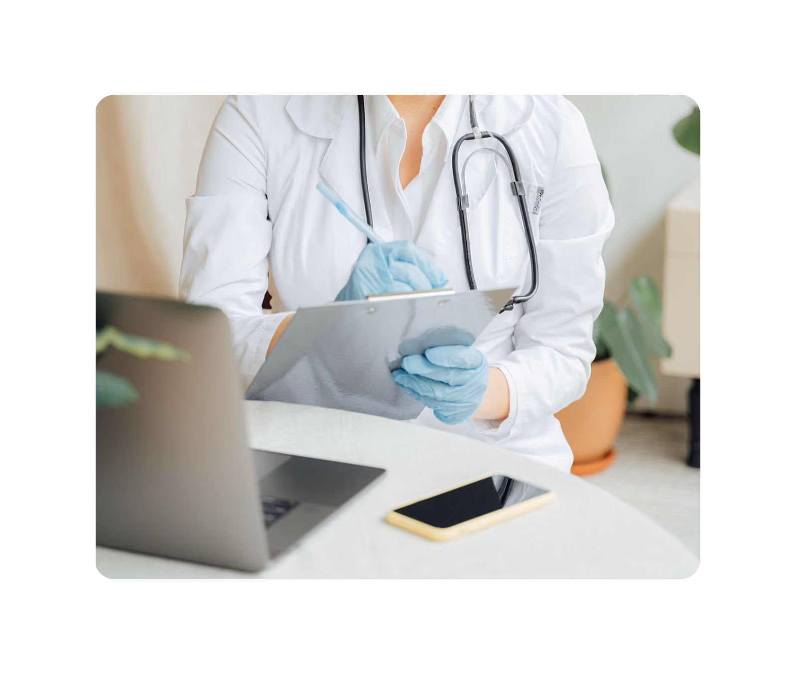Doctor working at a laptop with a stethoscope, badge reading "deeploi for HealthTech Companies"