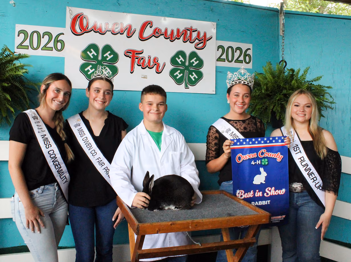 From left, Miss Congeniality Jenna Smith, Princess Makynlie Hall, Drew Jennings, 2026 Miss Owen County Makayla Hall and First Runner-up Tori Merchant pose with Jennings’ Grand Champion rabbit. CHLOE ODEN | THE OWEN NEWS