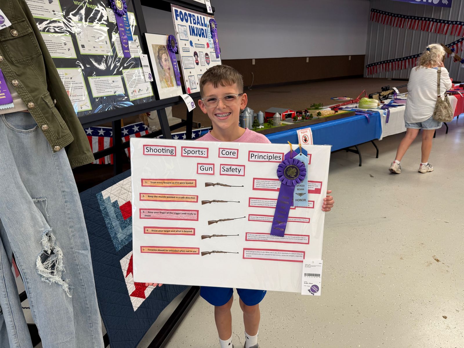 Shooting Sports Education Grand Champion Oliver Smith poses for a photo with the winning project at the 2026 Owen County Fair. NICOLE DECRISCIO | THE OWEN NEWS