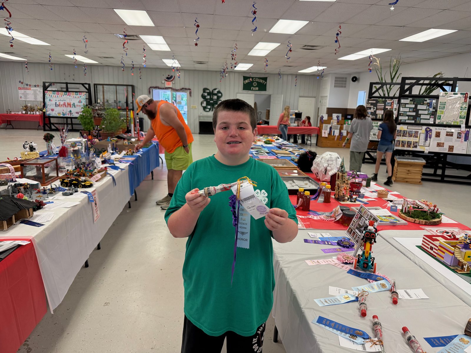 Level 2 Electric Reserve Grand Champion Easton Page poses for a photo with his winning project. NICOLE DECRISCIO | THE OWEN NEWS