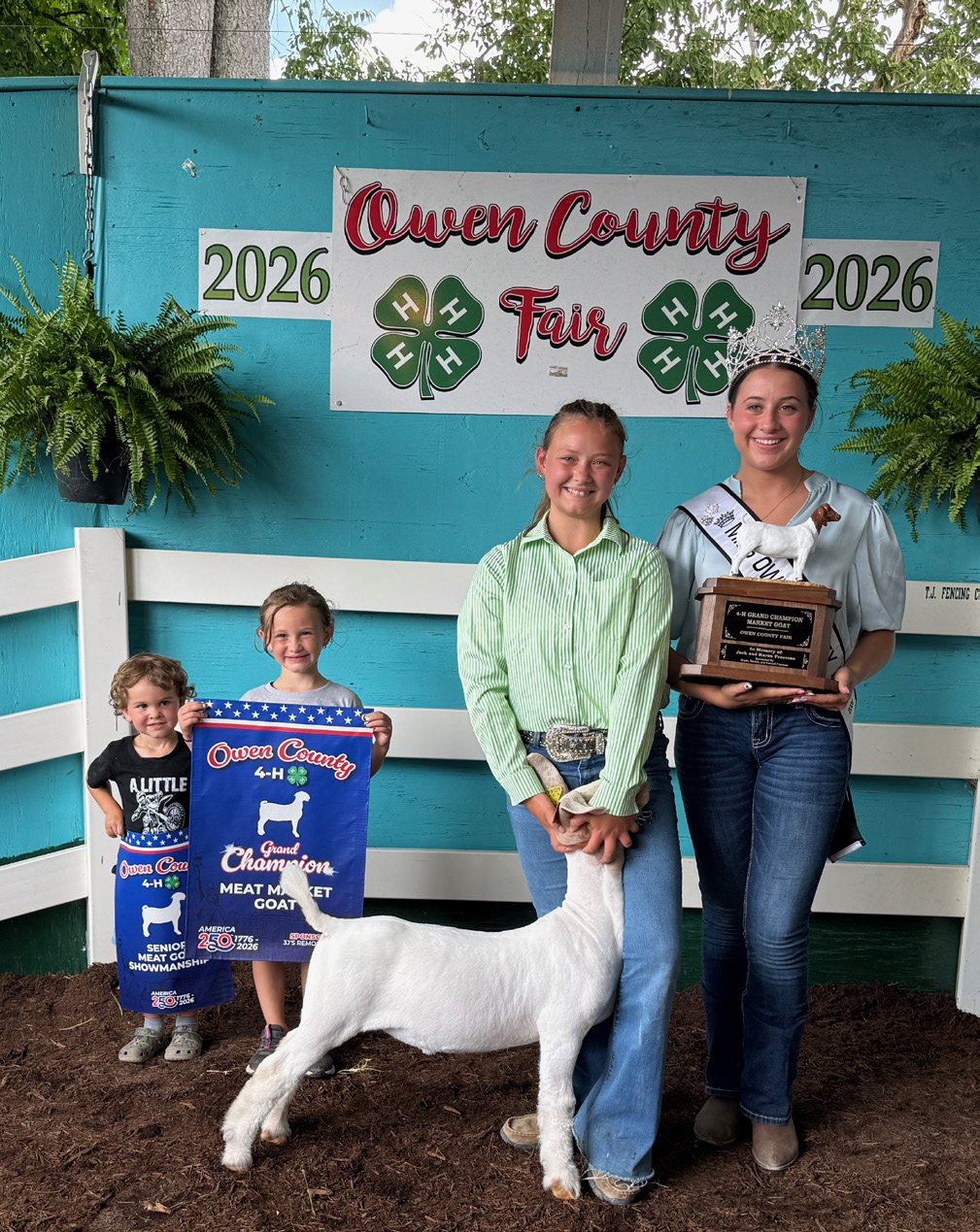 Regan Greene (center) walked away with Grand Champion Meat Market Goat honors at the 2026 Owen County Fair. NICOLE DECRISCIO | THE OWEN NEWS
