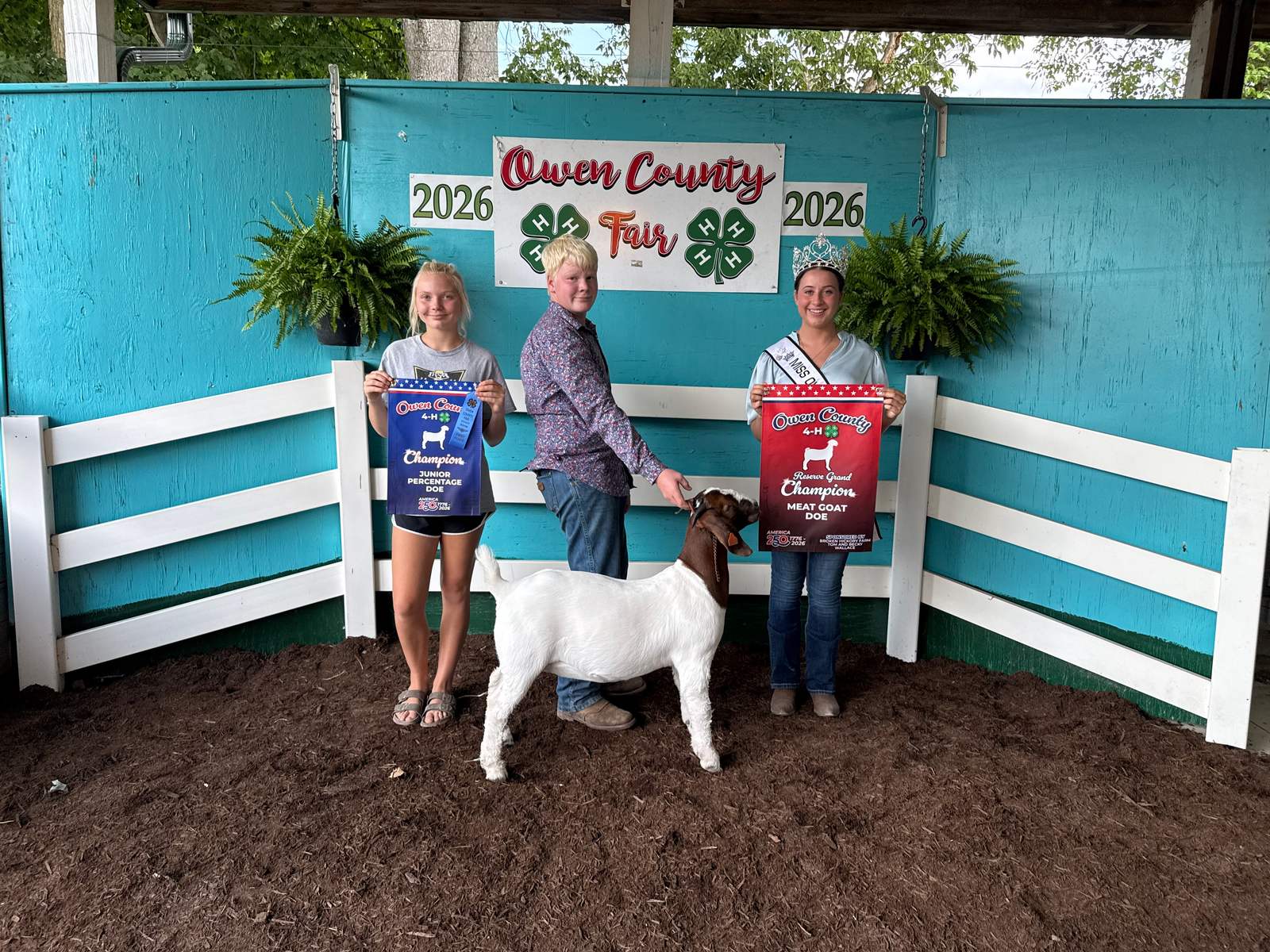 Jacob Salyers (center) earned Reserve Grand Champion Meat Goat Doe honors at the 2026 Owen County Fair. NICOLE DECRISCIO | THE OWEN NEWS