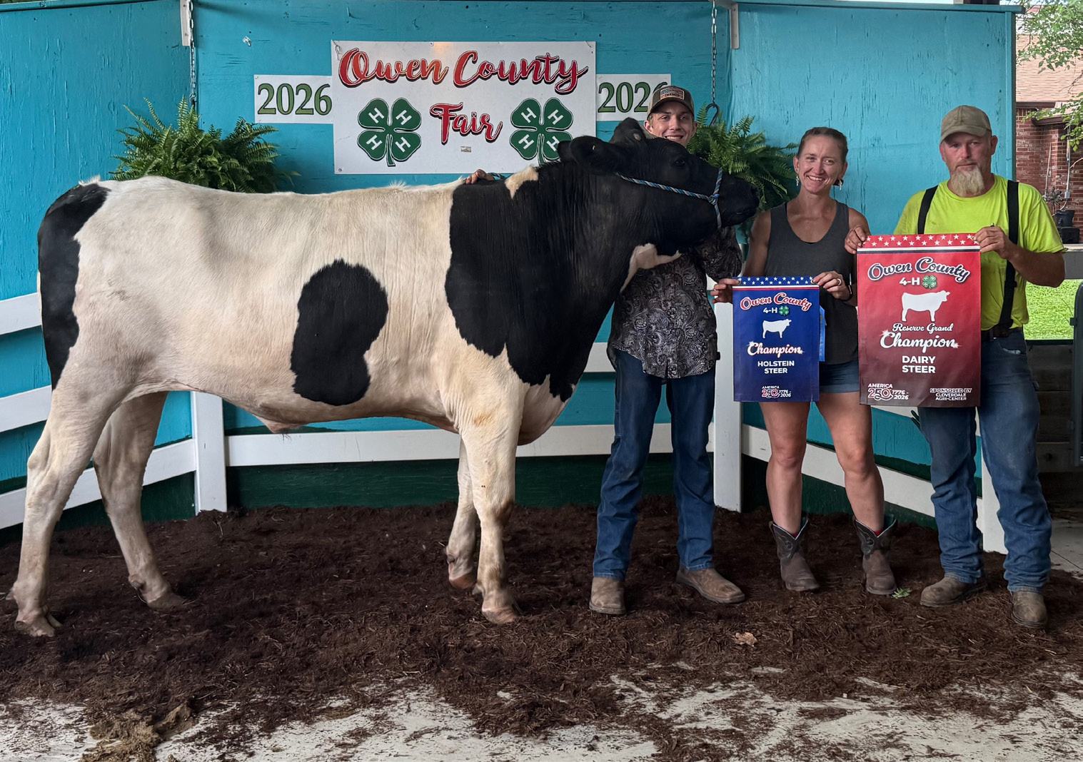 Zachary Rush is pictured with his Holstein entry, which earned Reserve Grand Champion Dairy Steer honors at the 2026 Owen County Fair. NICOLE DECRISCIO | THE OWEN NEWS