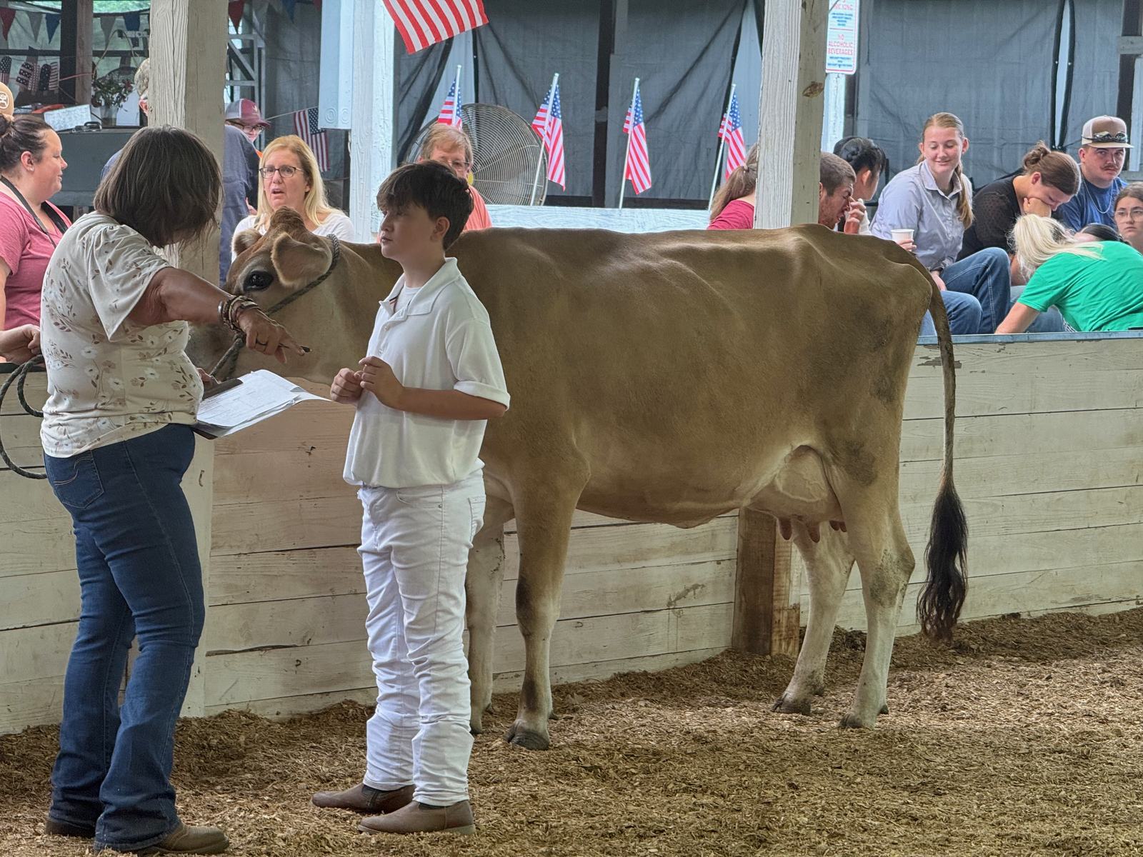 Tanner Wood interacts with the judge during the Round Robin showmanship competition at the 2026 Owen County Fair. NICOLE DECRISCIO | THE OWEN NEWS