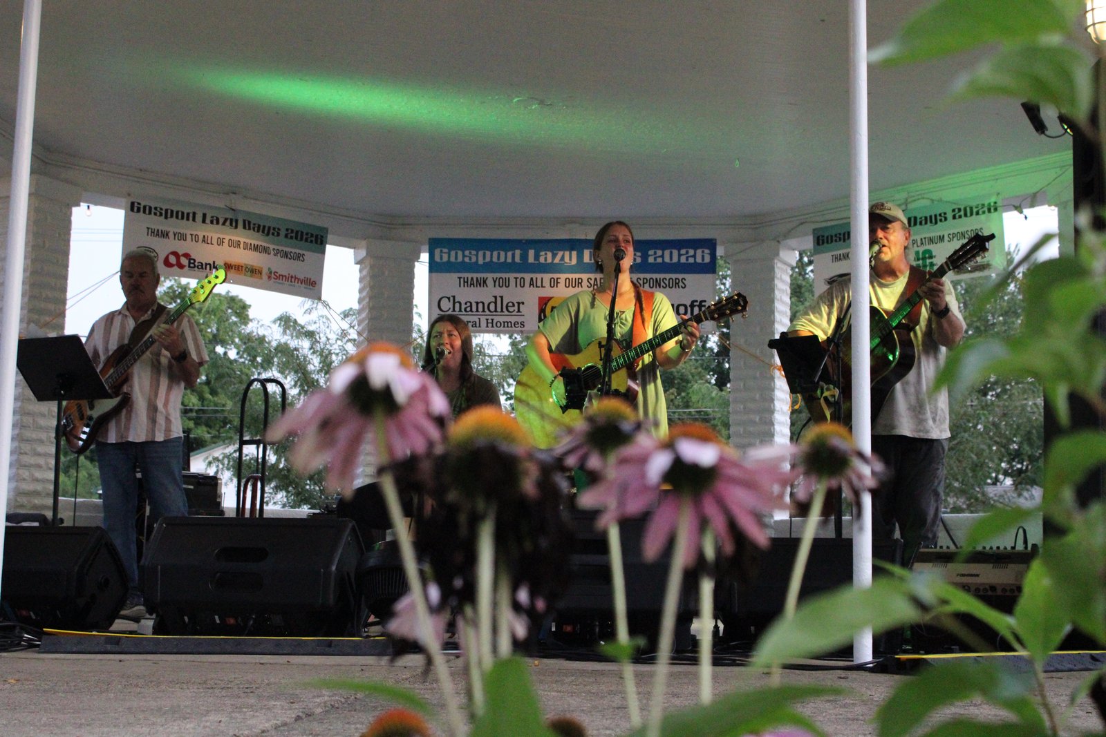 Despite a weather-related start delay, The Fab Four still managed to entertain the festival’s opening night crowd on the bandstand in Gosport Town Park. TYLER DEFORD