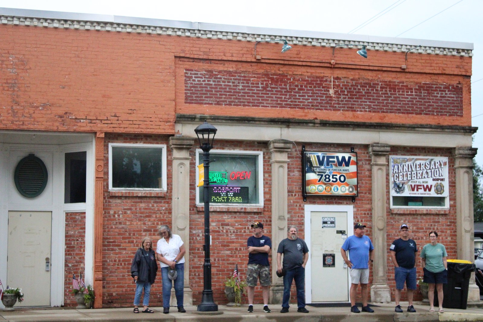 Gosport VFW Post #7850 members Russell Law, Mike Oakes, Mike Kent, Brian Pierce, Cathy Lietzman, and Candy Lester watch the setup of this year’s opening ceremonies. SUBMITTED PHOTO