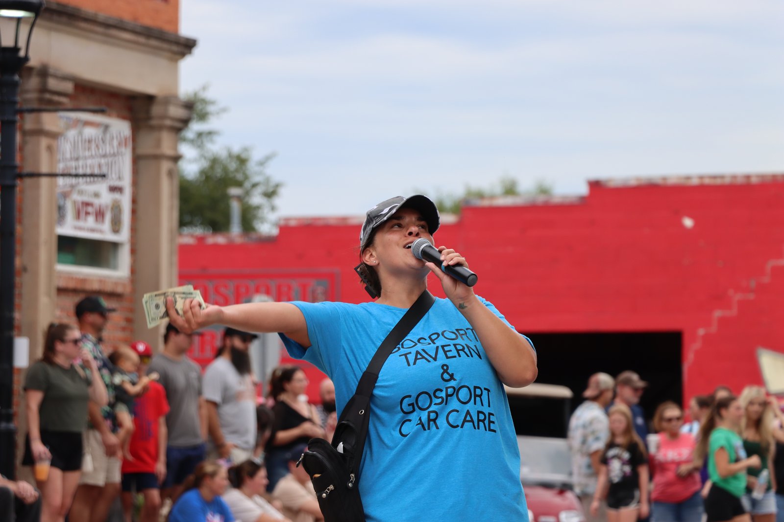 Kassie Smithey, daughter of long-time Bed Race MC Kip Seidenstucker, fires up the crowd at the 2026 Bed Races by announcing the grand cash prize for the winners. SUBMITTED PHOTO